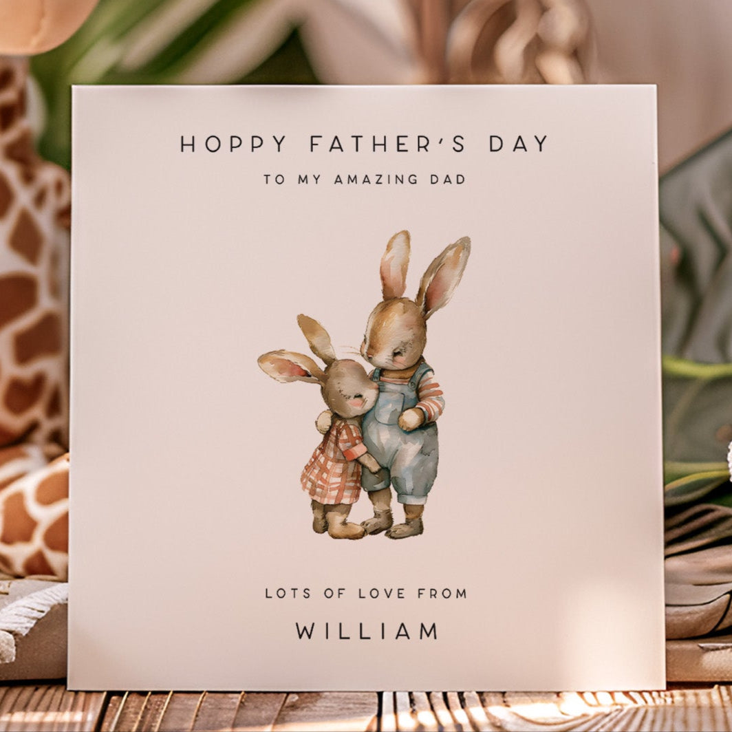 Hoppy Father's Day to an amazing Dad featuring a baby and daddy bunny in watercolour