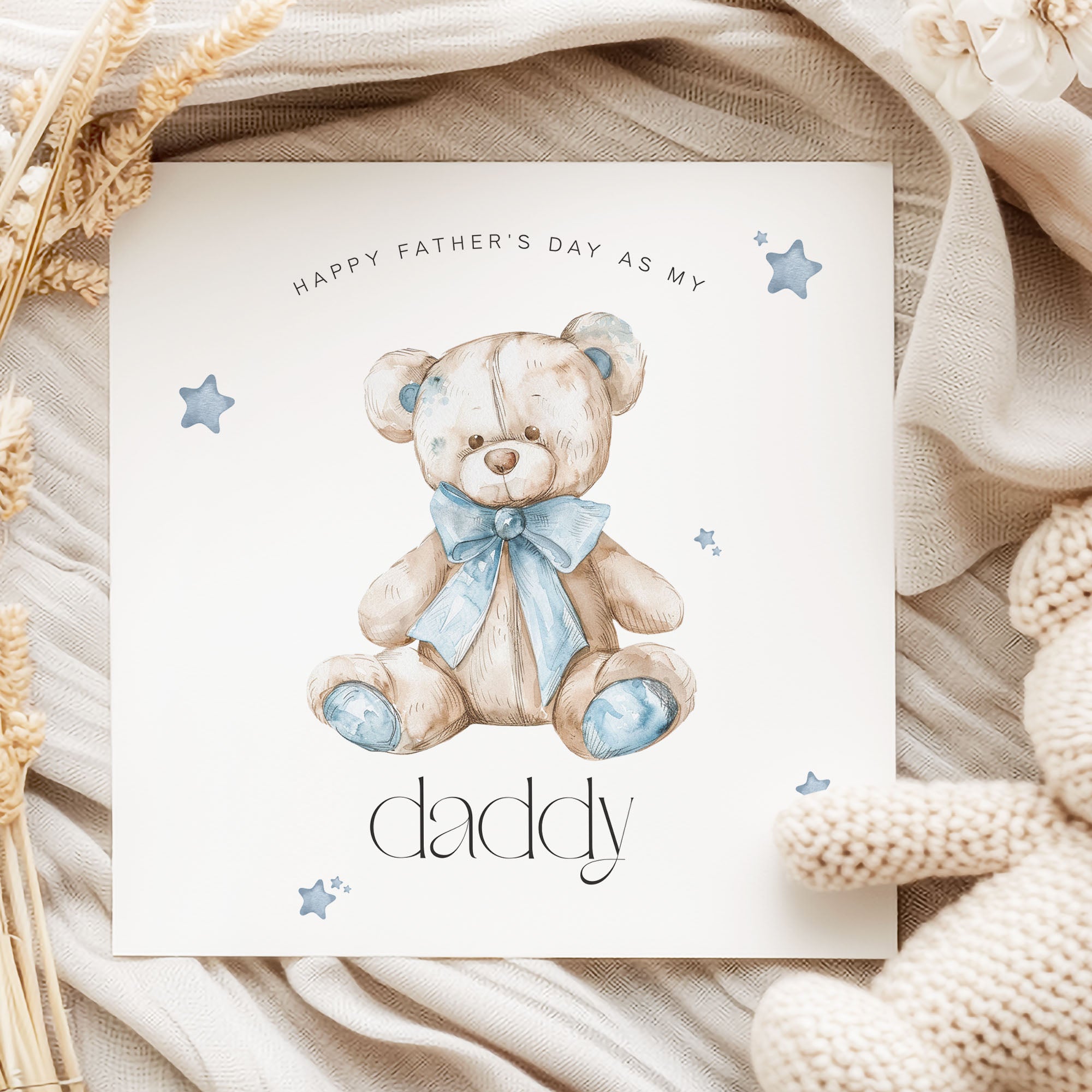 Teddy bear father days card with blue stars