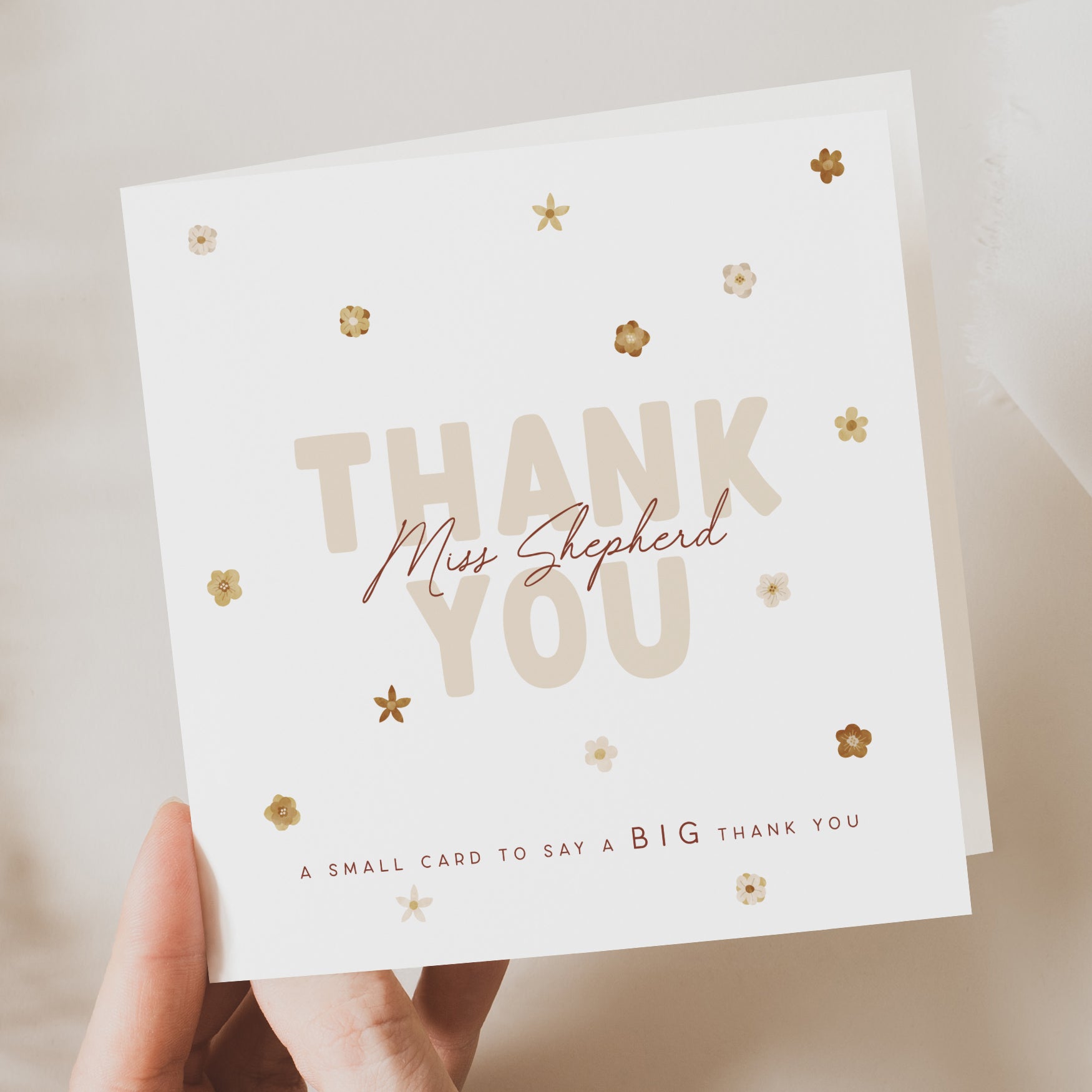 Personalised teacher thank you card featuring “THANK YOU” text with gold floral accents and custom name “Miss Shepherd.” Subtext reads “A small card to say a BIG thank you.”