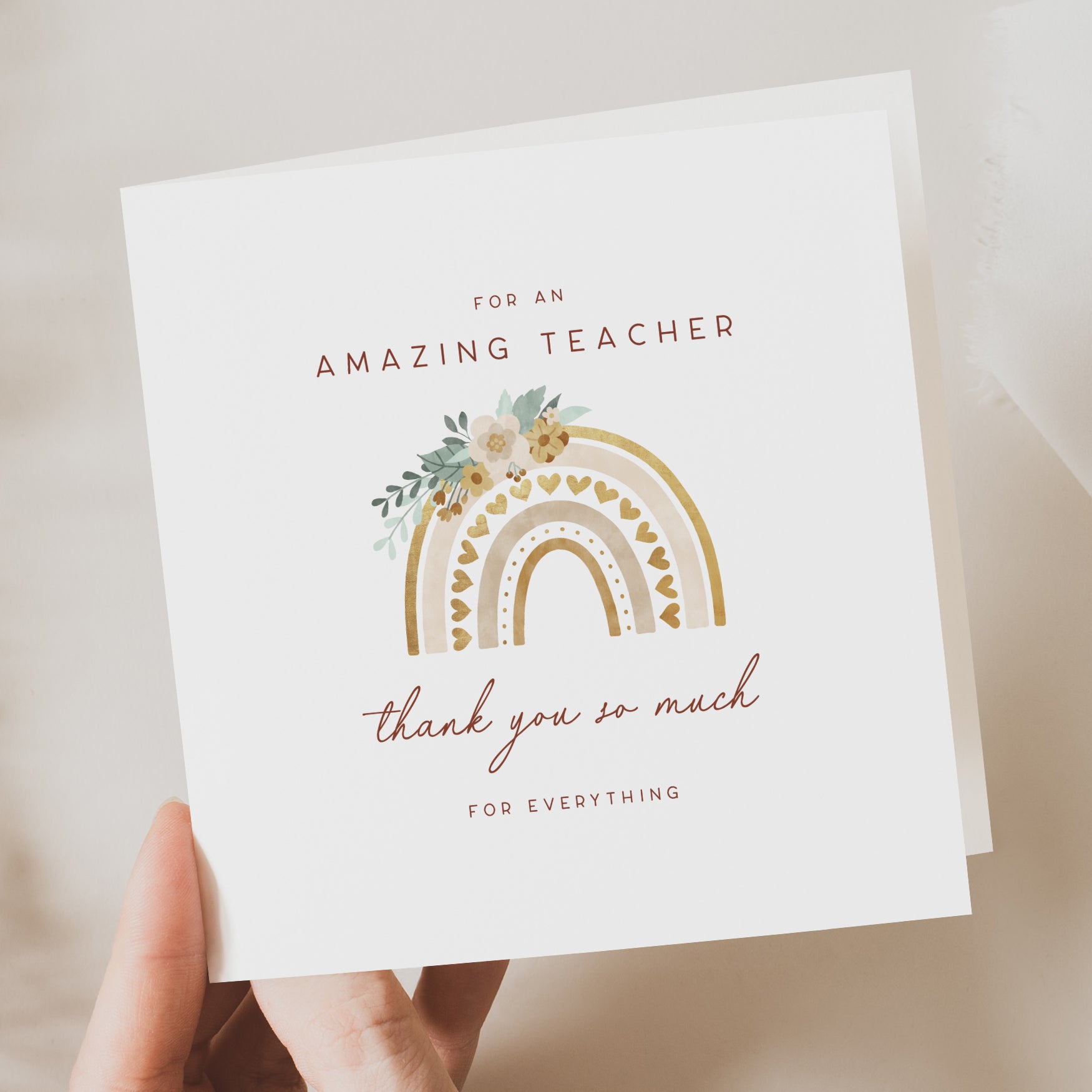 Floral rainbow teacher thank you card with the message “For an amazing teacher – thank you so much for everything.” Features hearts, soft tones, and botanical details.