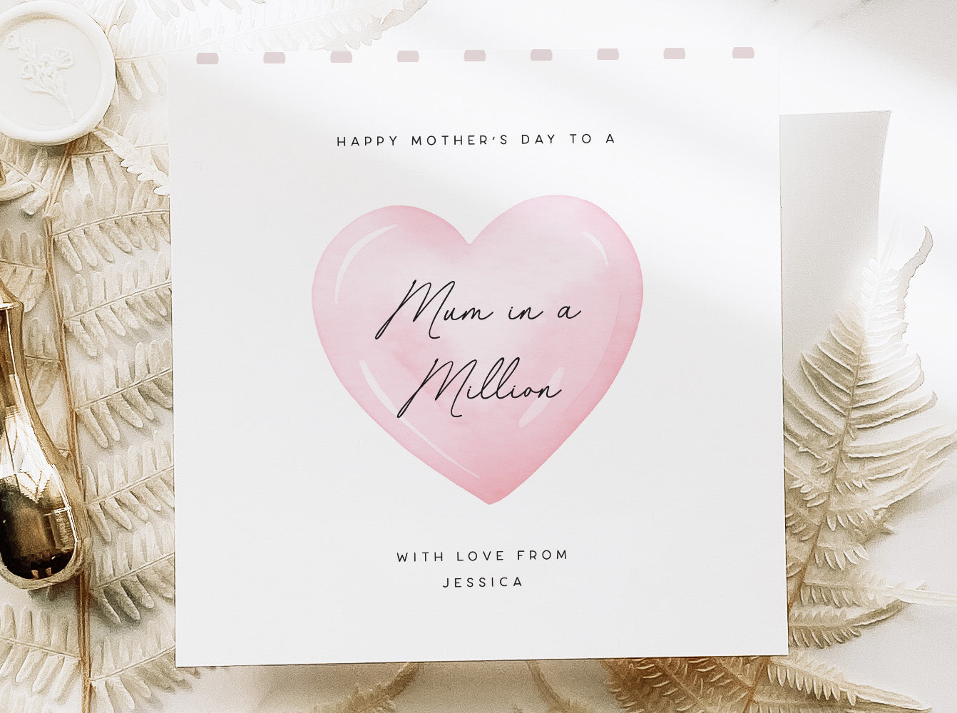 PERSONALISED MOTHERS DAY CARD WITH A OINK HEART IN THE MIDDLE AND MUM IN A MILLION PRINTED ON THE FRONT