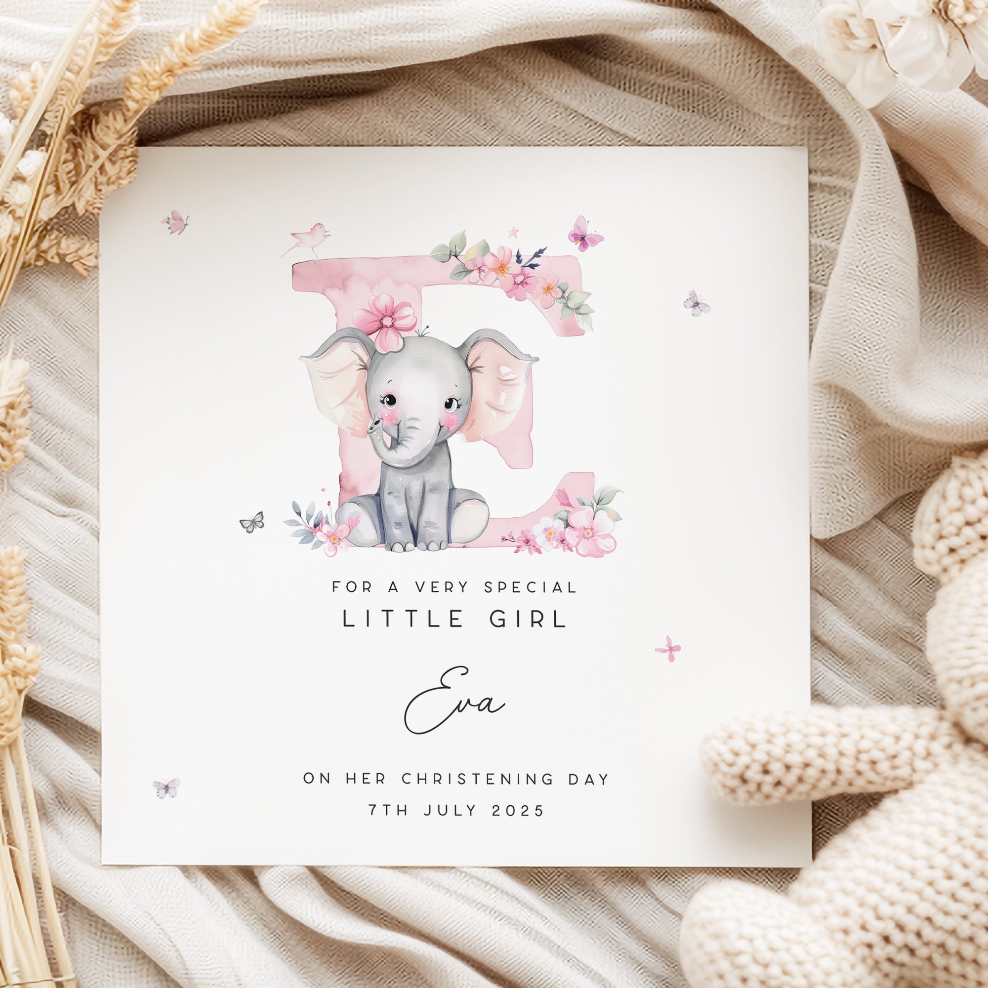 Personalised christening card for little girl with cute elephant and pink floral design, custom name and christening date keepsake card