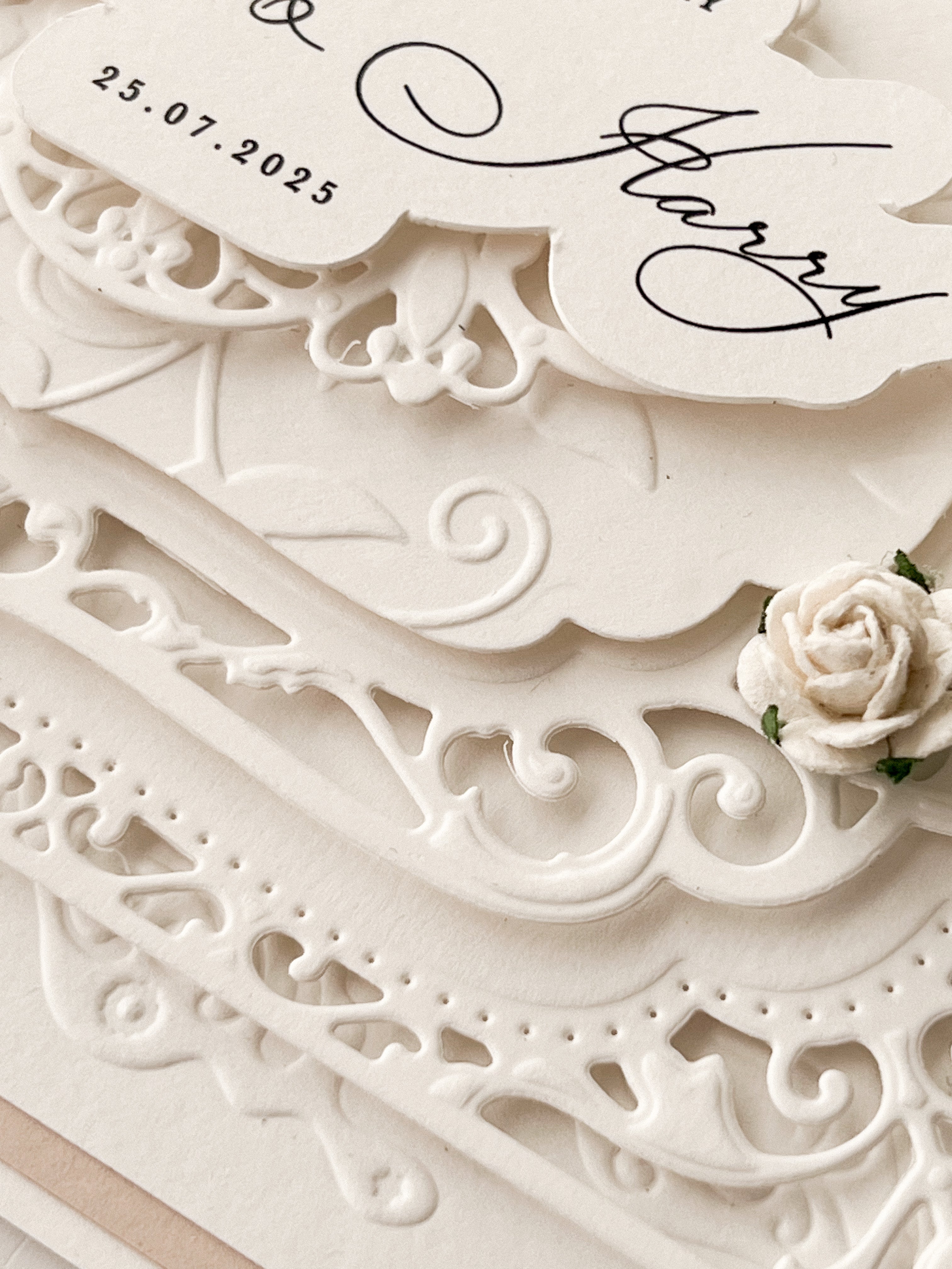 close up of the embossing and debossing on our personalised wedding day card