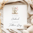 To my Husband on your 1st Father's Day featuring a daddy and baby polar bear with red hearts.